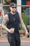 Joel Madden shows off his inked body