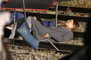 *EXCLUSIVE* Jennifer Aniston and Anna Kendrick film intense scene laying on railroad tracks