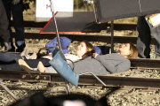 *EXCLUSIVE* Jennifer Aniston and Anna Kendrick film intense scene laying on railroad tracks