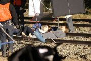 *EXCLUSIVE* Jennifer Aniston and Anna Kendrick film intense scene laying on railroad tracks