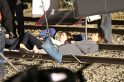 *EXCLUSIVE* Jennifer Aniston and Anna Kendrick film intense scene laying on railroad tracks