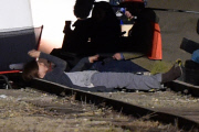 *EXCLUSIVE* Jennifer Aniston and Anna Kendrick film intense scene laying on railroad tracks