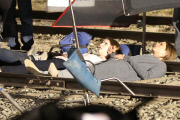 *EXCLUSIVE* Jennifer Aniston and Anna Kendrick film intense scene laying on railroad tracks