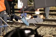 *EXCLUSIVE* Jennifer Aniston and Anna Kendrick film intense scene laying on railroad tracks