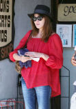 Carla Bruni-Sarkozy stops by a guitar shop