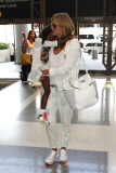 Heidi Klum and daughter Lou Samuel jet out of LAX