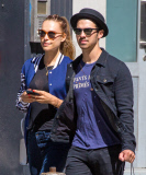 Joe Jonas and Blanda Eggenschwiler match their darks 