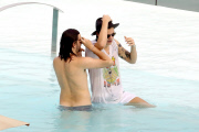 Harry Styles shows off his tattoo-filled body in Brazil
