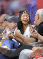 Rihanna enjoys the Clippers vs Thunder game court side