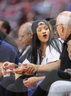 Rihanna enjoys the Clippers vs Thunder game court side