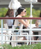 Kendall Jenner enjoys a bite of lunch with some friends at the Hotel Eden Roc.