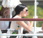 Kendall Jenner enjoys a bite of lunch with some friends at the Hotel Eden Roc.
