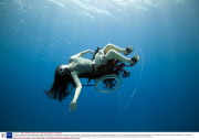 Sue Austin will perform swimming pool acrobatics in the world's first underwater wheelchair, London, Britain - 30 Aug 2012