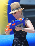 January Jones Squirts A Water-Gun At Malibu Beach Party