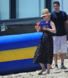 January Jones Squirts A Water-Gun At Malibu Beach Party