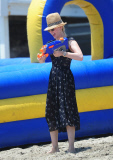 January Jones Squirts A Water-Gun At Malibu Beach Party