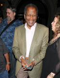 Sidney Poitier in a great mood at Craig's
