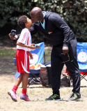 Heidi Klum and Seal share a friendly Kiss at their children's soccer game