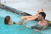 Ryan Phillippe and Paulina Slagter take a dip in the pool