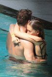 Ryan Phillippe and Paulina Slagter take a dip in the pool