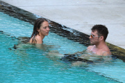 Ryan Phillippe and Paulina Slagter take a dip in the pool