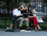 Famke Janssen bikes to a picnic with boyfriend Cole Frates and pet Licorice