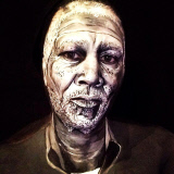 Make up artist transforms herself into famous faces, London Britain, June 2014