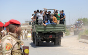 Iraqi Shia volunteer for war
