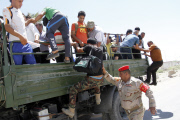 Iraqi Shia volunteer for war