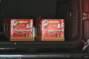 Rihanna makes a discreet getaway with her beer