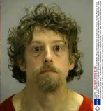William C. Caldwell, III arrested while dressed as an elf after telling a mall Santa Claus he had a bomb, Morrow, Georgia, America - 02 Dec 2009