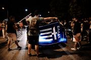 : Greeks celebrate after the qualification of the Greek team to the next phase of World Cup 2014
