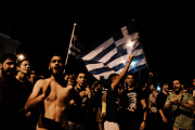 : Greeks celebrate after the qualification of the Greek team to the next phase of World Cup 2014