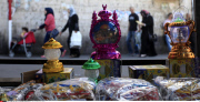 A Palestinian man sells a traditional Ramadan lantern in his shop at a market in the West Bank City of Ramallah