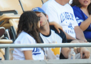 Mila Kunis and Ashton Kutcher take Mila's Baby Bump dressed in Dodgers blue to L.A. Dodgers Baseball Game