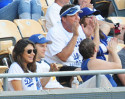 Mila Kunis and Ashton Kutcher take Mila's Baby Bump dressed in Dodgers blue to L.A. Dodgers Baseball Game