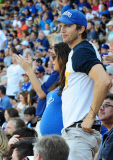 Mila Kunis and Ashton Kutcher take Mila's Baby Bump dressed in Dodgers blue to L.A. Dodgers Baseball Game