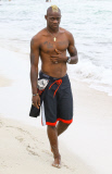 Semi-Exclusive... Mario Balotelli & Fanny Neguesha Out For A Stroll On The Beach 