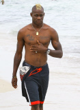 Semi-Exclusive... Mario Balotelli & Fanny Neguesha Out For A Stroll On The Beach 