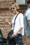 A frail-looking Meg Ryan manages to give a thumbs up