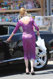 Melanie Griffith stocks up at the news stand