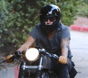 PREMIUM EXCL Harry Styles riding his motorcycle