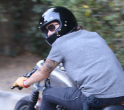 PREMIUM EXCL Harry Styles riding his motorcycle