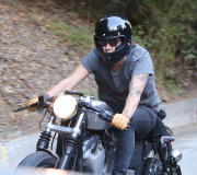 PREMIUM EXCL Harry Styles riding his motorcycle