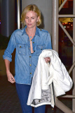 *EXCLUSIVE* *WEB EMBARGO UNTIL 3AM PST 07/25/14** Charlize Theron shows off her engagement ring at LAX! **MUST CALL FOR PRICING** **NO WEB**