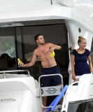 EXC - Liam Payne throws bananas in the sea