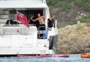 EXC - Liam Payne throws bananas in the sea
