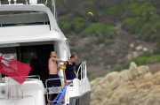EXC - Liam Payne throws bananas in the sea