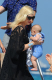 Gwen Stefani and Apollo get help off yacht **USA ONLY** 