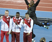 Usain Bolt photobombs the England team p..........